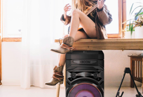 girl with audio speaker